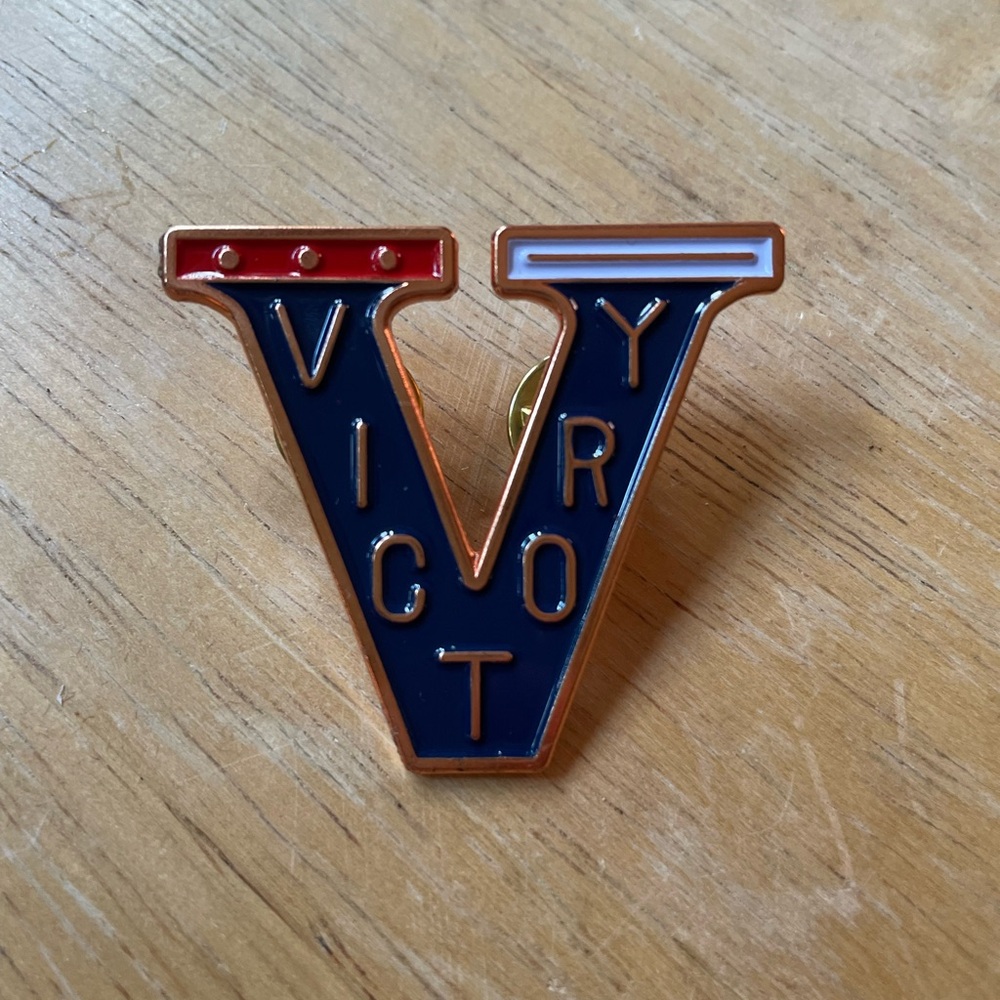 Besame Cosmetics Victory Lapel Pin.